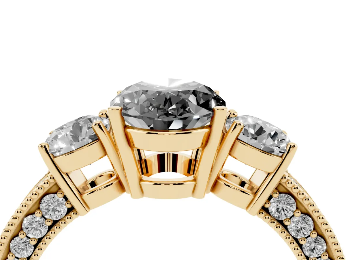 Fancy Black Oval Cut Three-Stone Diamond Ring with Pavé Band and Four-Prong Setting Yellow gold