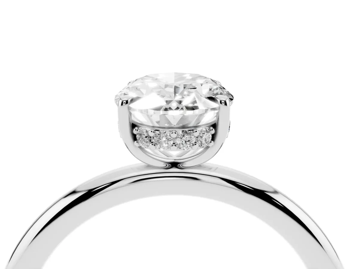Oval Cut Diamond Solitaire Ring with Thin Band and Four-Prong Setting Silver