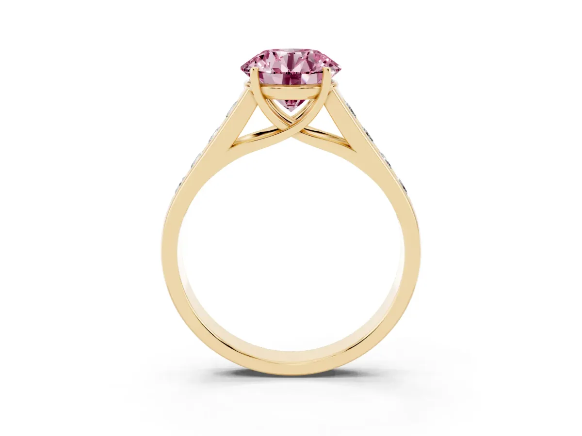 Fancy Pink Round Cut Solitaire Channel-Set Diamond Engagement Ring with Four-Prong Setting Yellow gold