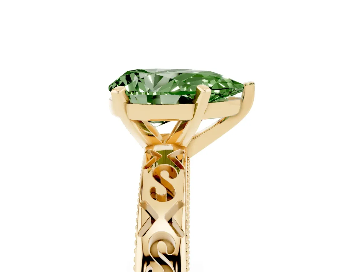 Fancy Green Pear Cut Solitaire Engagement Ring with Scrollwork Band and Four-Prong Setting Yellow gold