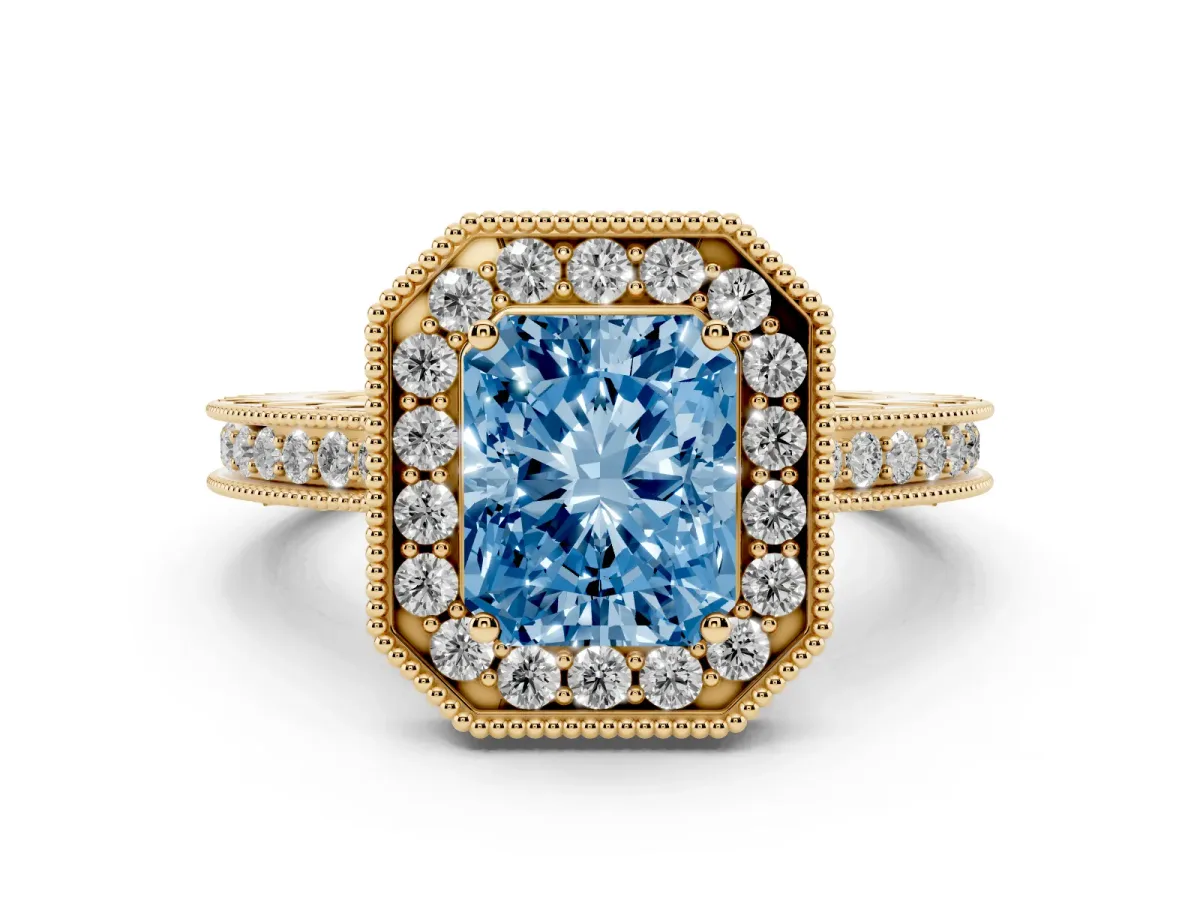 Fancy Blue Radiant Cut Diamond Milgrain Halo Engagement Ring with Round Pavé Band and Prong Setting Yellow gold