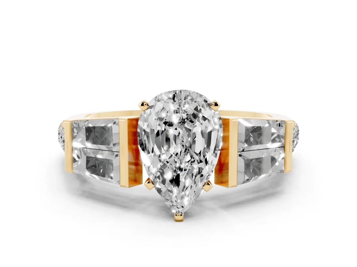 Pear Cut Diamond Engagement Ring with Baguette Side Stones and Channel Set Band Yellow gold