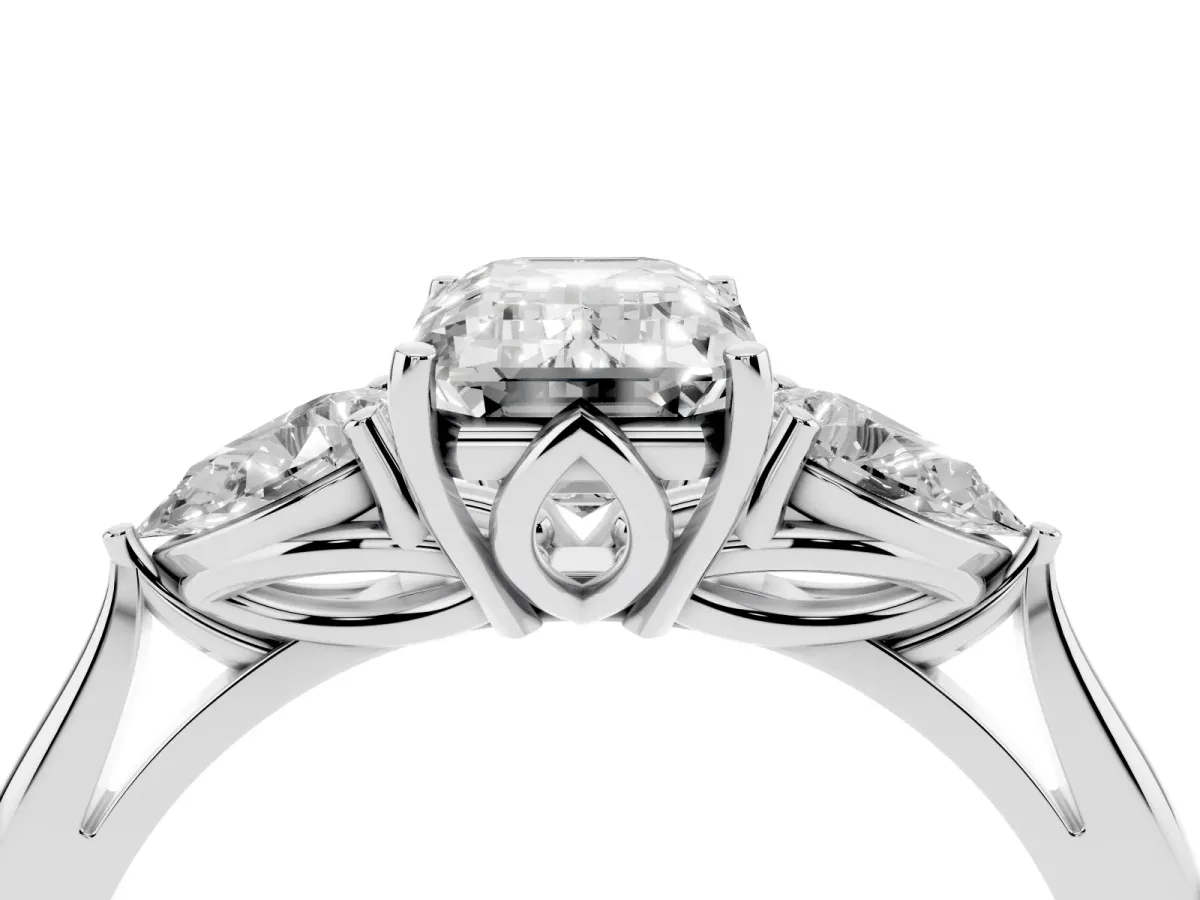Emerald Cut Diamond Three-Stone Ring with Pear Side Stones and Prong Setting Silver
