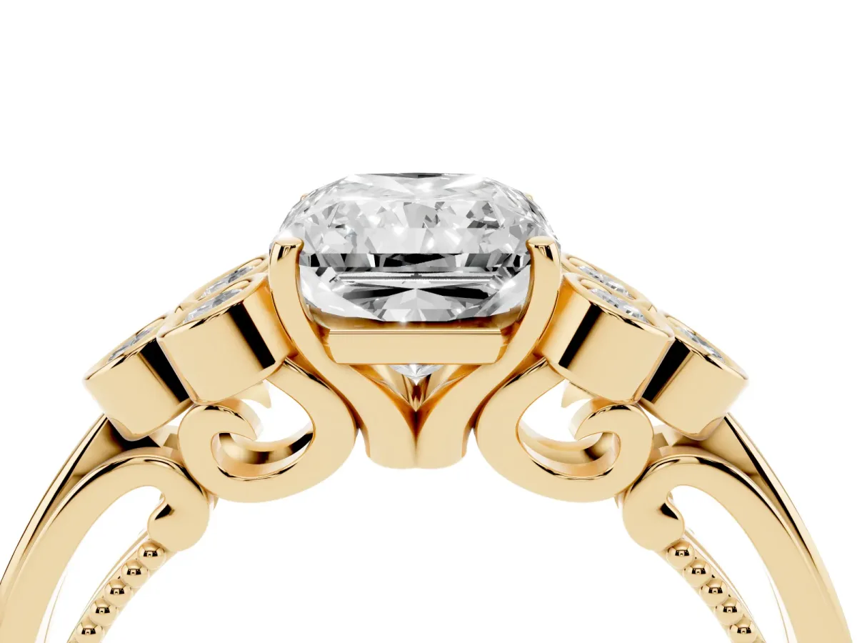 Radiant Cut Cut Diamond Engagement Ring with Bezel Set Round Side Stones and Prong Setting Yellow gold