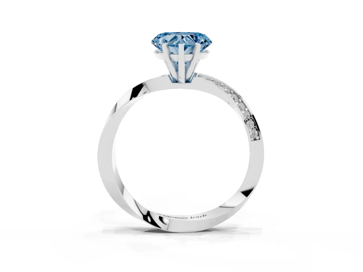 Fancy Blue Heart Cut Diamond Engagement Ring with Side Stone Accents and Four-Prong Setting Silver