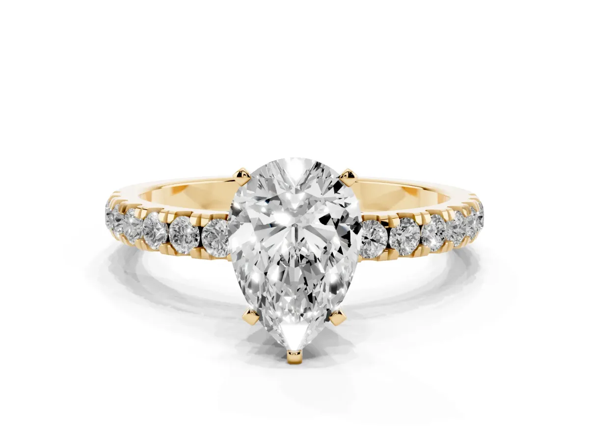 Pear Cut Diamond Solitaire Ring with Pavé Accents and Four-Prong Setting Yellow gold
