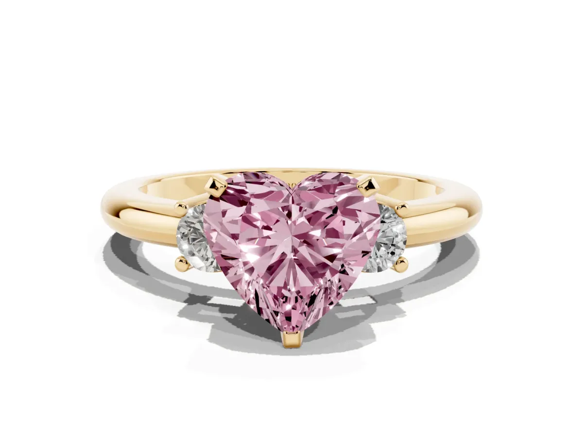 Fancy Pink Three-Stone Heart Cut Cut Diamond Solitaire with Prong Setting and Classic Band Yellow gold