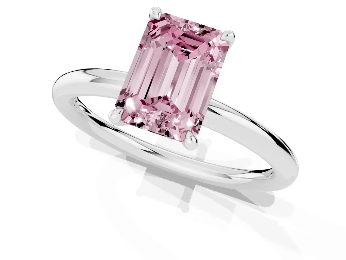 Fancy Pink Emerald Cut Diamond Solitaire Ring with Thin Band and Four-Prong Setting Platinum