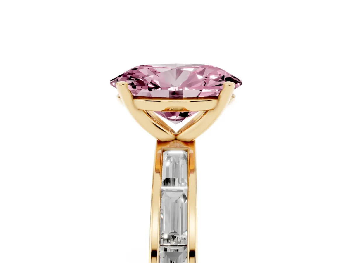 Fancy Pink Oval Cut Solitaire Diamond Ring with Channel-Set Baguette Band and Four-Prong Setting Yellow gold
