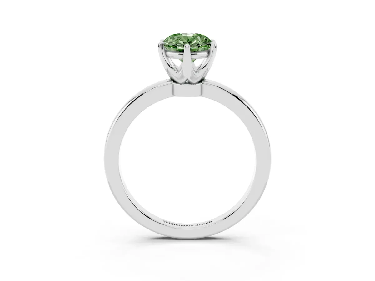 Fancy Green Oval Cut Solitaire Diamond Ring with Six-Prong Setting on a Classic Band Silver