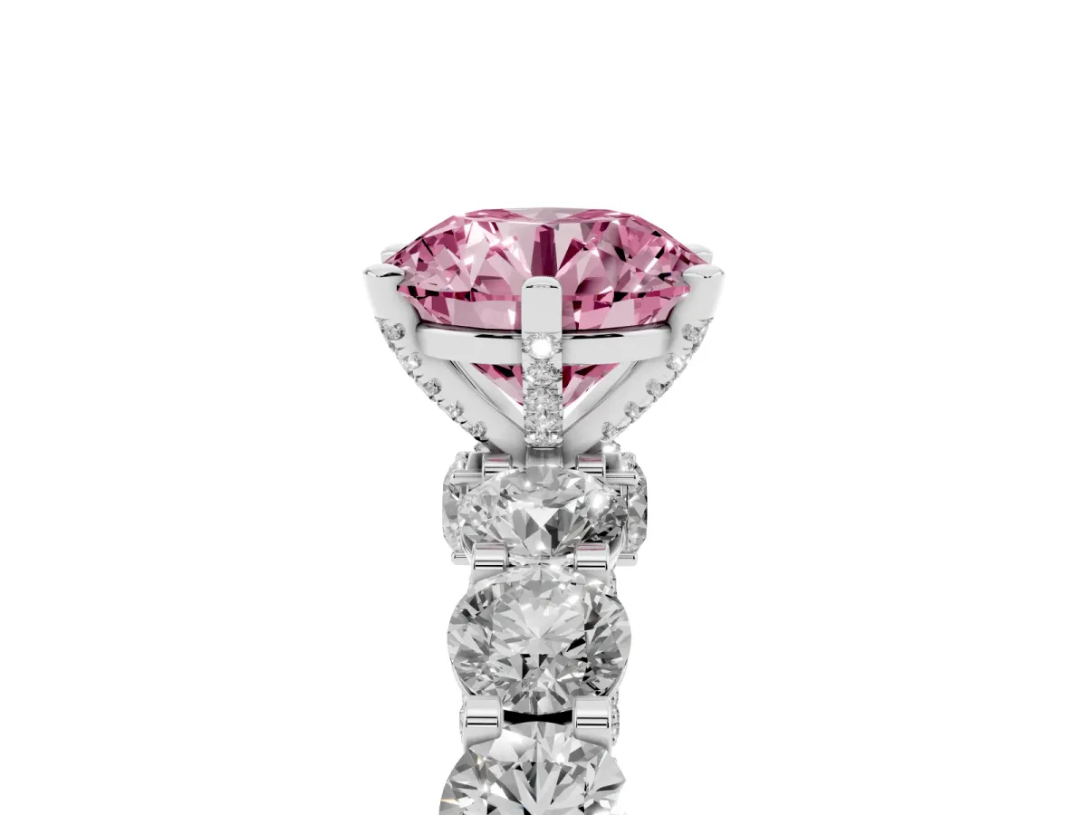 Fancy Pink Round Cut Diamond Side Stone Engagement Ring with Four-Prong Setting Silver