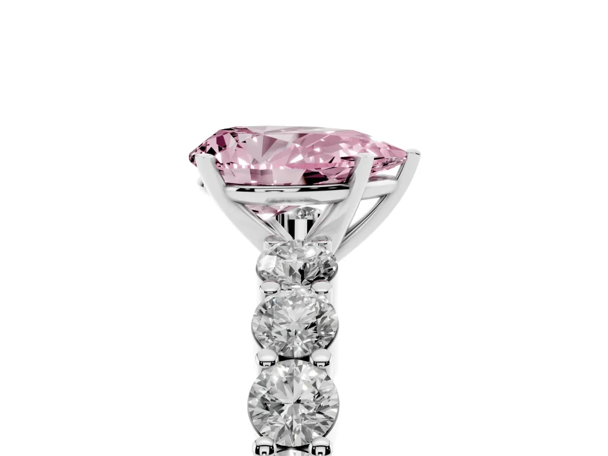 Fancy Pink Pear Cut Diamond Solitaire Ring with Shared Prong Round Side Stones White gold