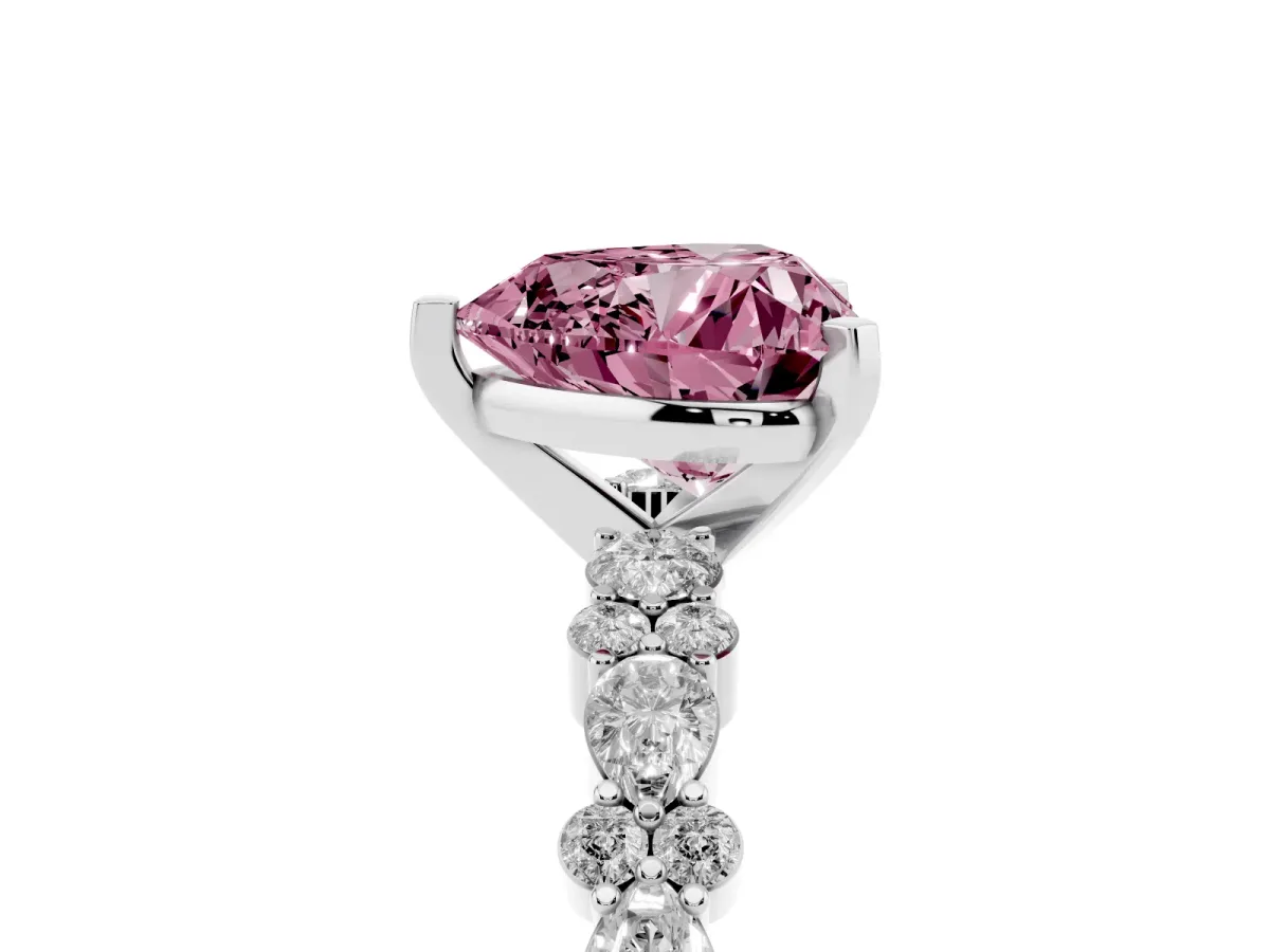 Fancy Pink Heart Cut Diamond Side Stone Solitaire Ring with Round and Four-Prong Setting Platinum