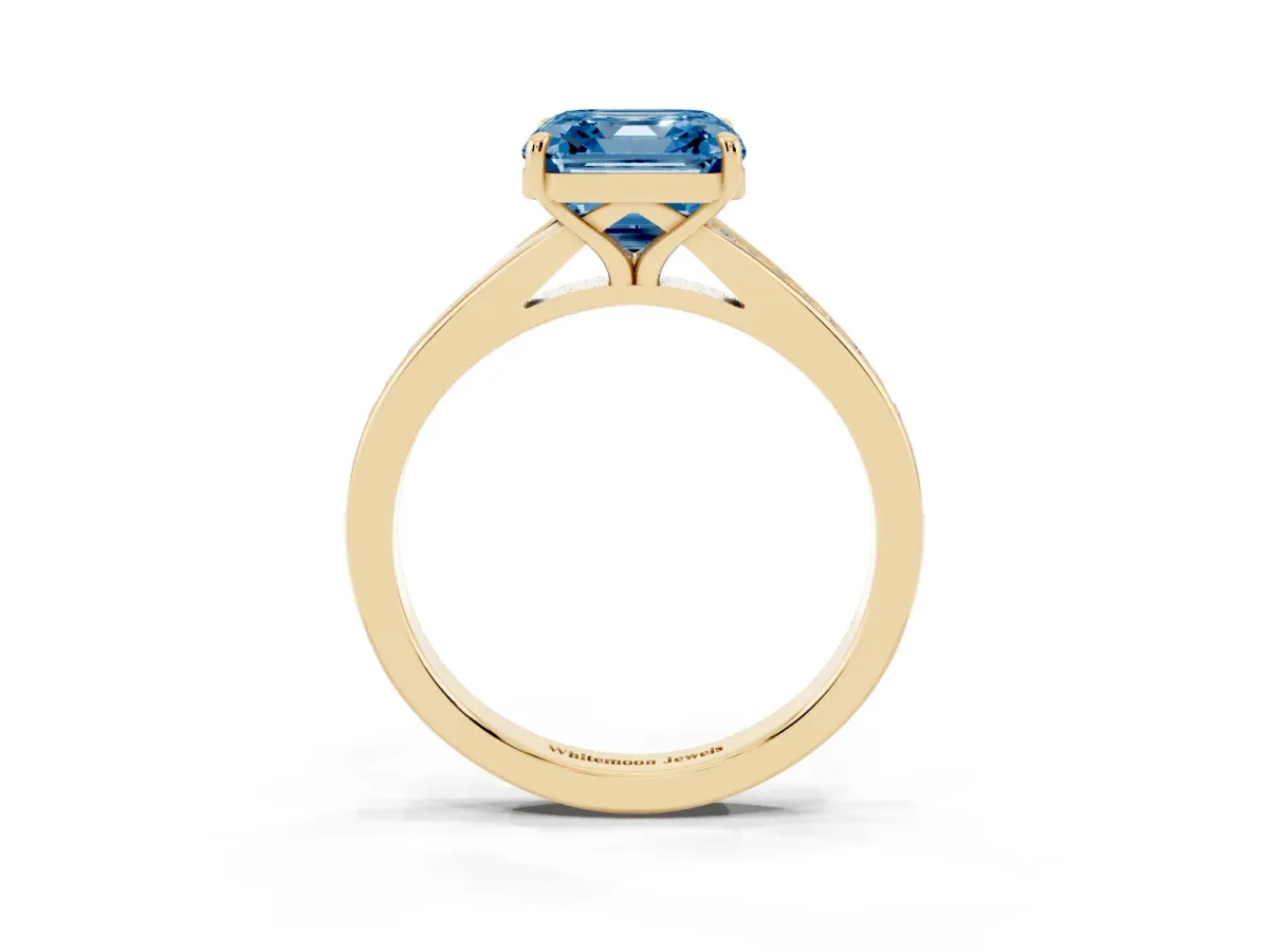 Fancy Blue Asscher Cut Diamond Solitaire Ring with Pavé Band and Prong Setting Yellow gold