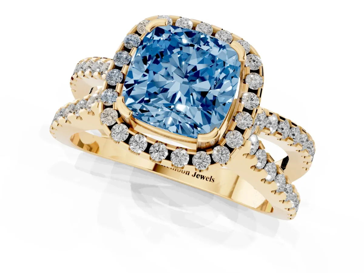 Fancy Blue Cushion Cut Diamond Halo Ring with Split Shank Pavé Band and Prong Setting Yellow gold