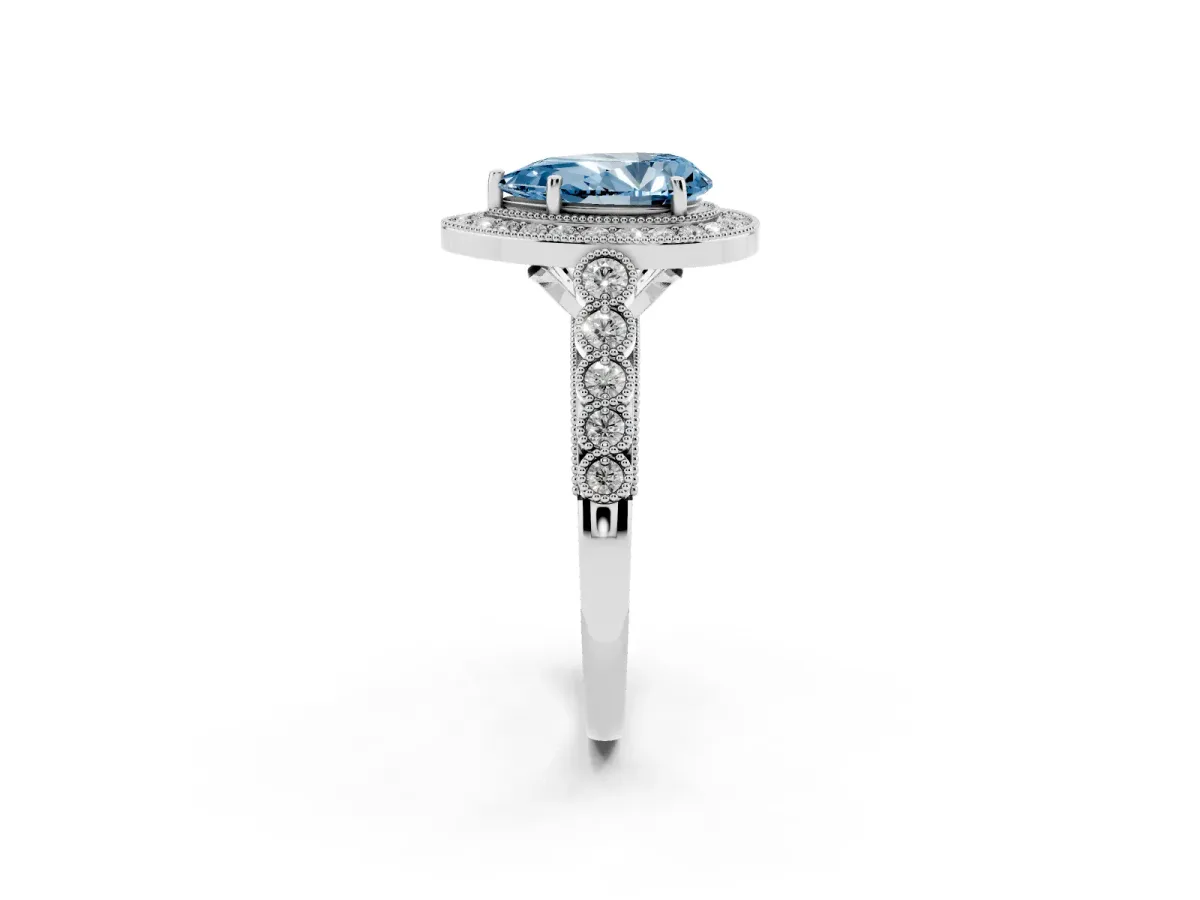 Fancy Blue Pear Cut Halo Milgrain Solitaire with Bezel Set Side Stones and Pave Band Silver