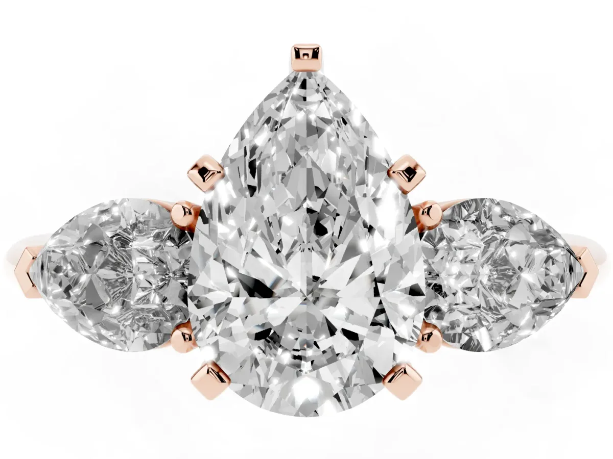 Three-Stone Pear Cut Diamond Ring with Pear Side Stones and Four-Prong Setting Rose gold