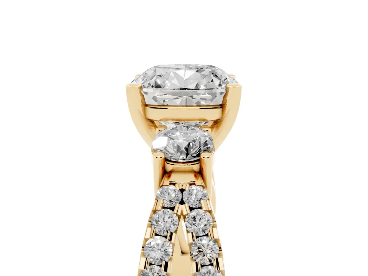 Cushion Cut Diamond Three-Stone Ring with Pavé Split Shank and Four-Prong Setting Yellow gold