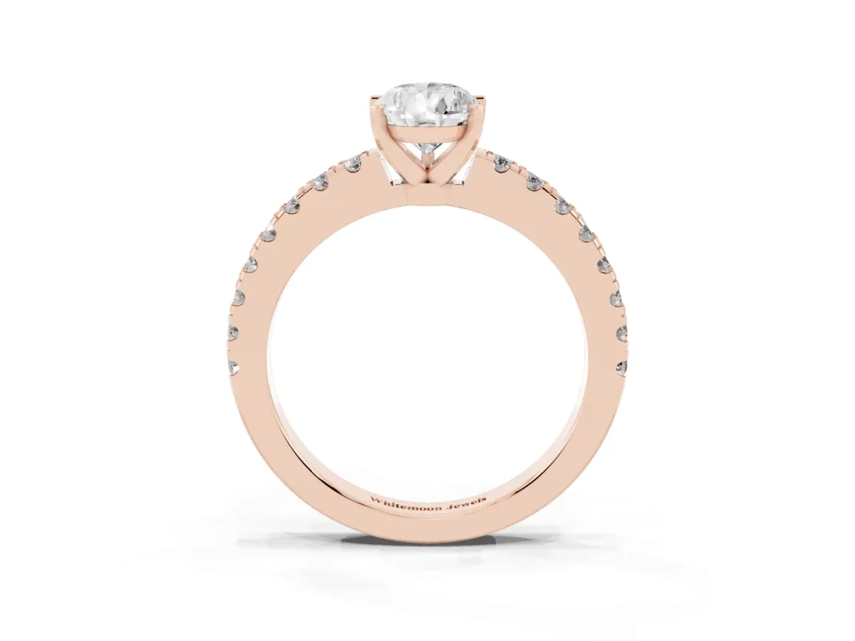 Pear Cut Solitaire Diamond with Pavé Band and Four-Prong Setting Rose gold
