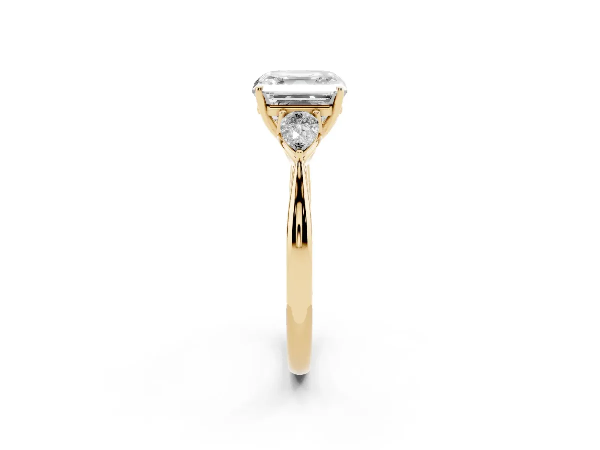 Three-Stone Asscher Cut Brilliant Diamond Solitaire Ring with Tapered Band and Four-Prong Setting Yellow gold