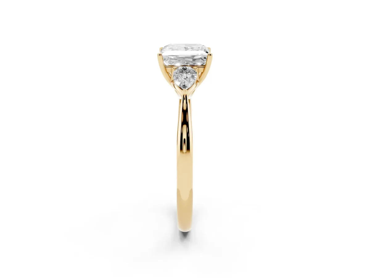 Princess Cut Diamond Three-Stone Ring with Pear Side Stones and Prong Setting Yellow gold