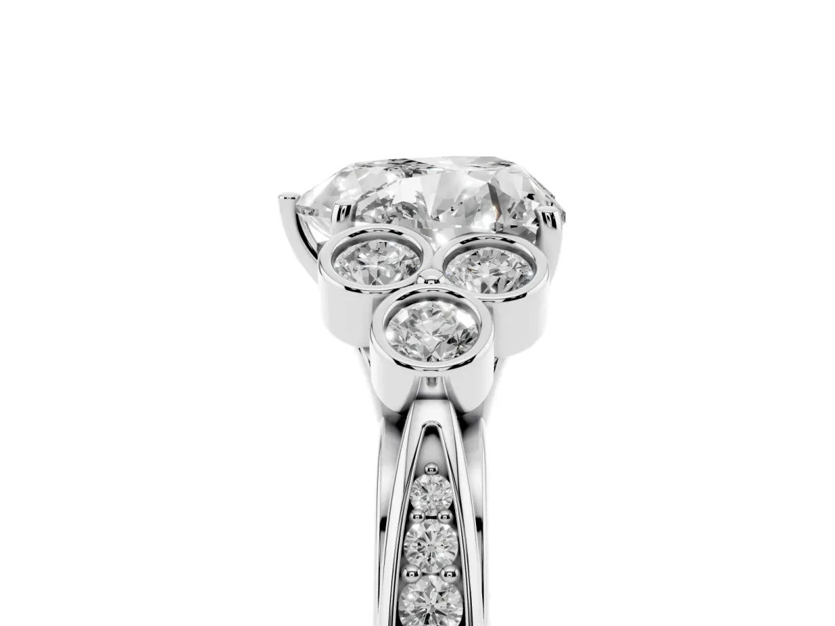 Heart Cut Cut Diamond Engagement Ring with Bezel Set Round Side Stones and Prong Setting Silver