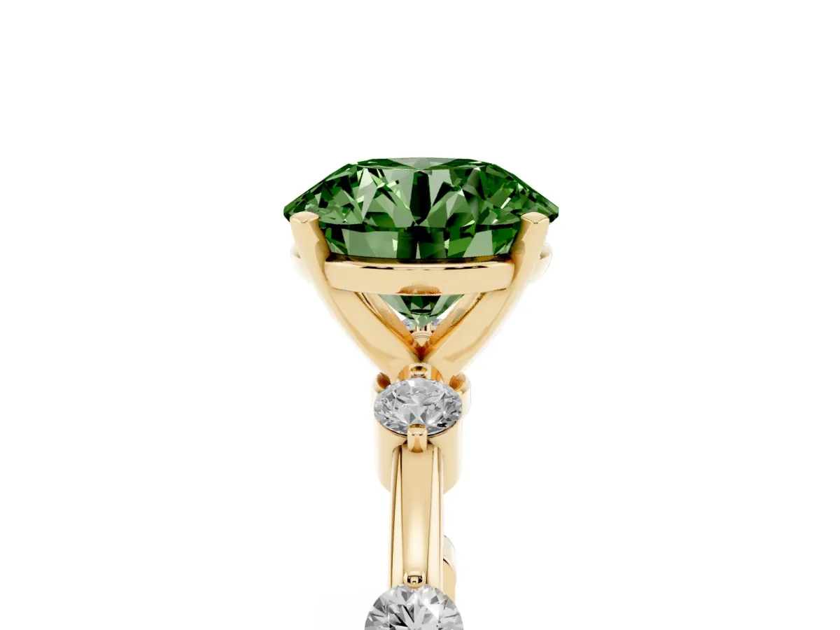 Fancy Green Round Cut Solitaire Diamond Ring with Bezel Set Side Stones and Prong Setting Yellow gold