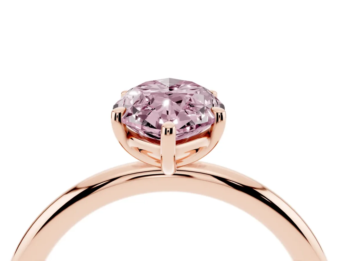 Fancy Pink Oval Cut Solitaire Diamond Ring with Four-Prong Setting on a Plain Band Rose gold