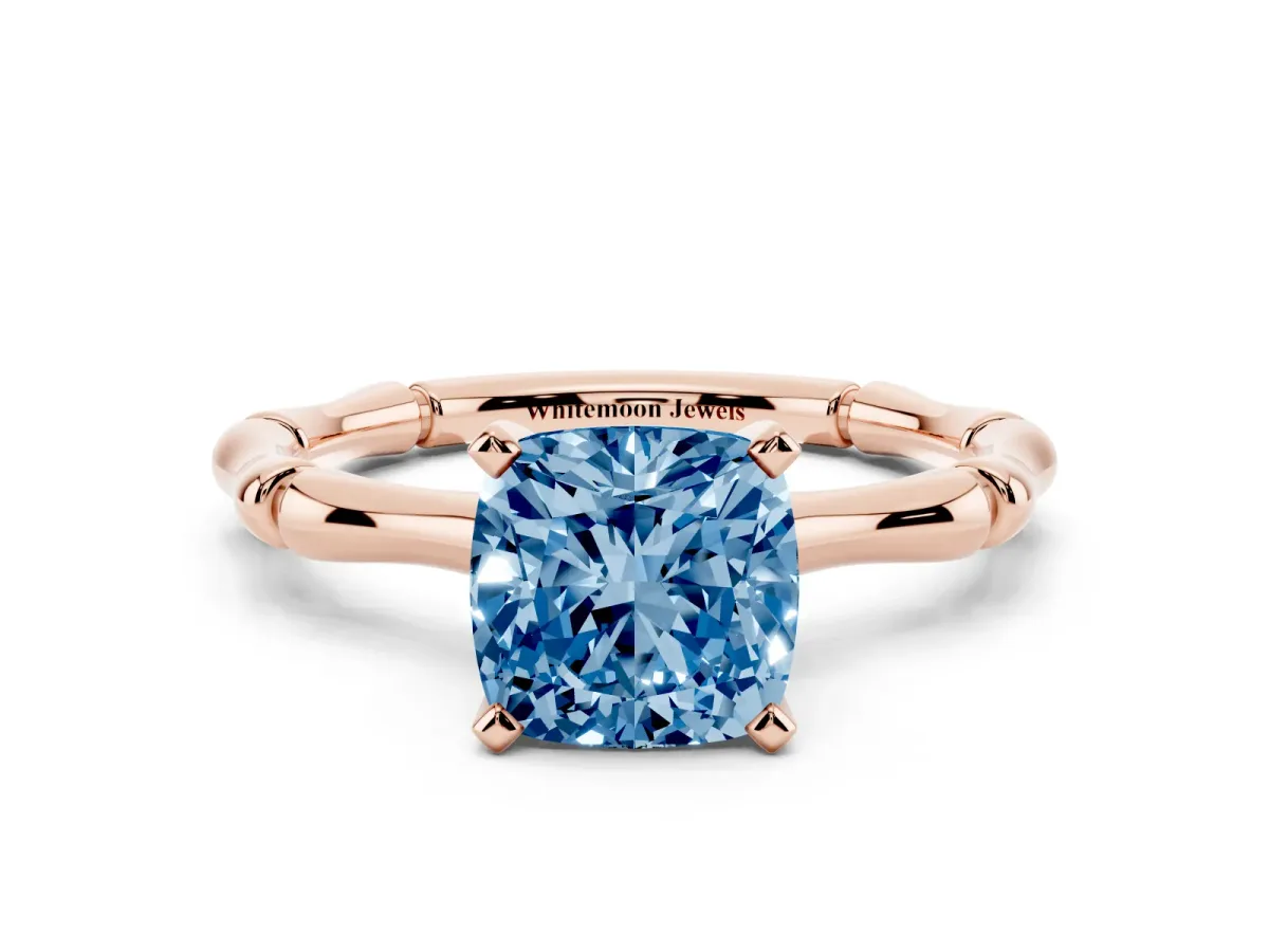 Fancy Blue Cushion Cut Solitaire Diamond Ring with Bamboo Band and Four-Prong Setting Rose gold