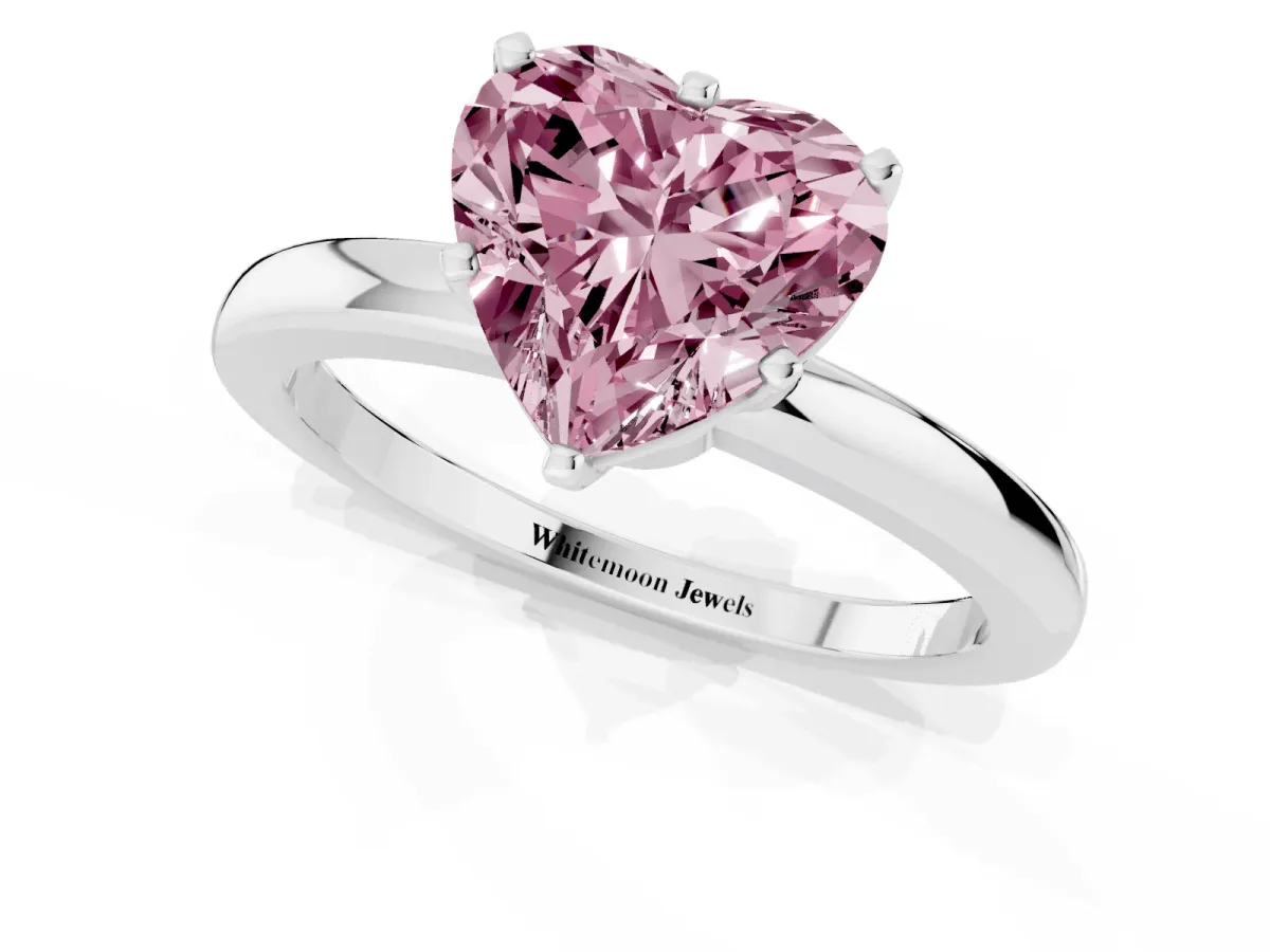 Fancy Pink Heart Cut Solitaire Diamond Ring with Six-Prong Setting on a Classic Band Silver