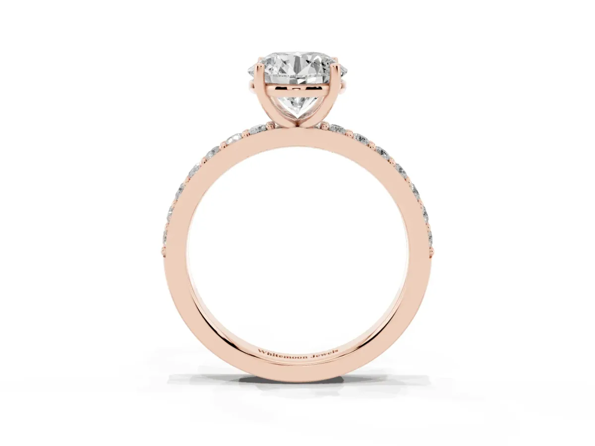 Round Cut Cut Diamond Solitaire with Pave Band and Four-Prong Setting Rose gold