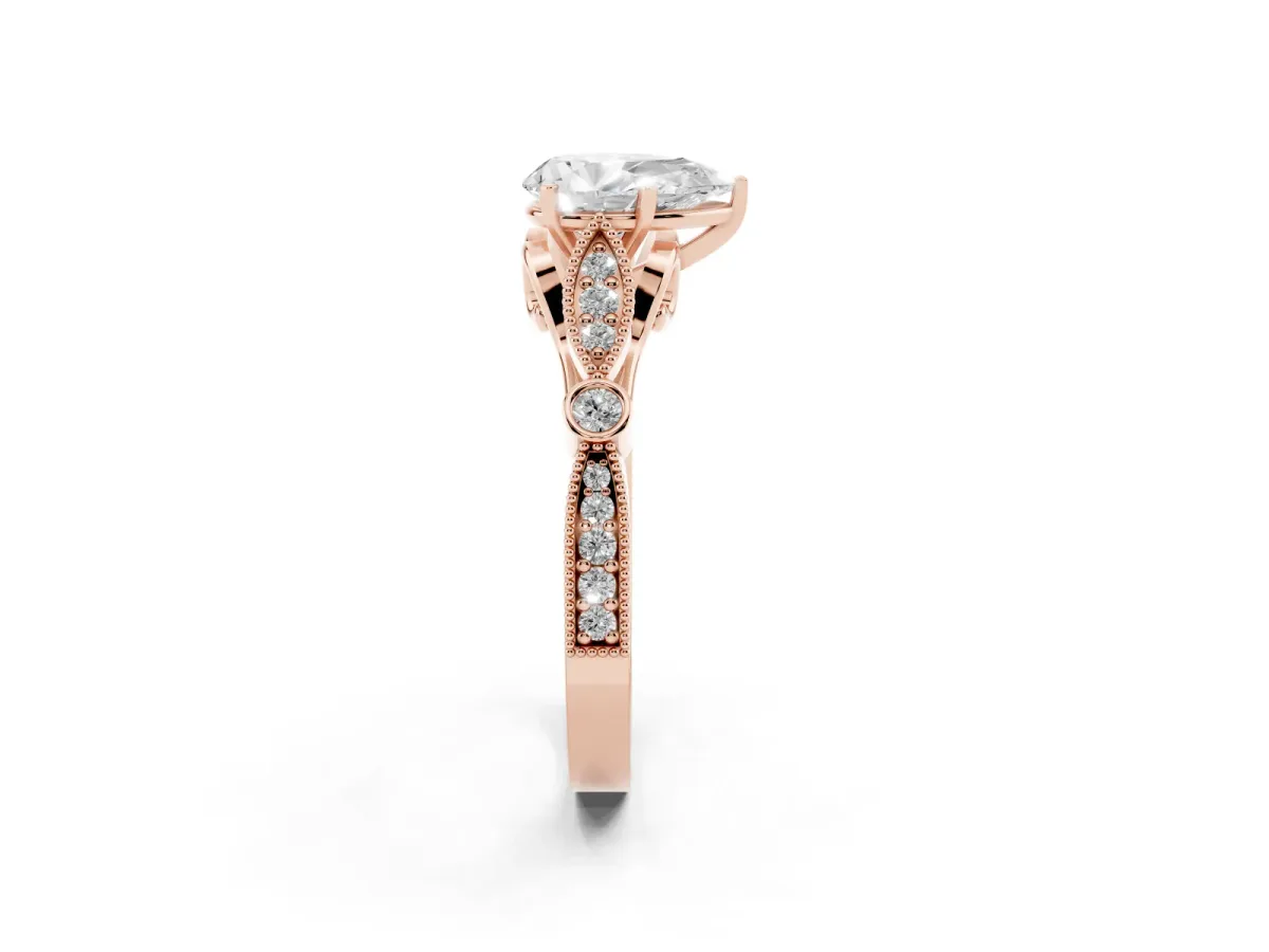 Pear Cut Cut Diamond with Milgrain Marquise and Bezel Accents on a Solitaire Band with Prong Setting Rose gold