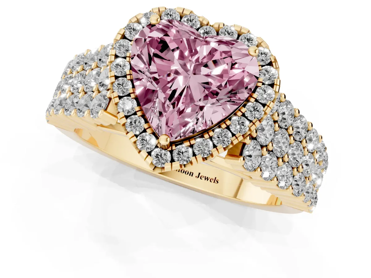 Fancy Pink Heart Cut Diamond Halo Engagement Ring with Triple Row Round Pavé Band and Prong Setting Yellow gold