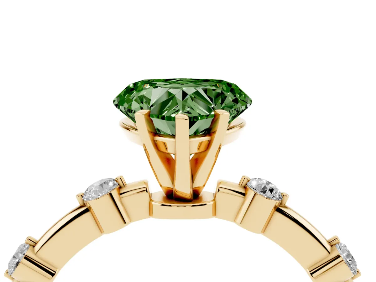 Fancy Green Heart Cut Solitaire Diamond Ring with Bezel Set Side Stones and Prong Setting Yellow gold