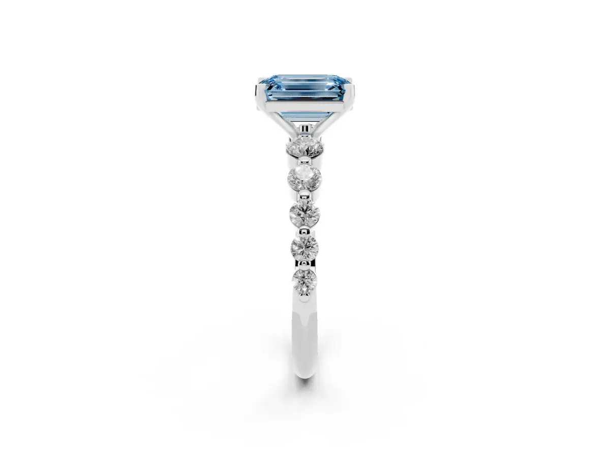 Fancy Blue Emerald Cut Solitaire Diamond Ring with Pave Band and Four-Prong Setting Silver