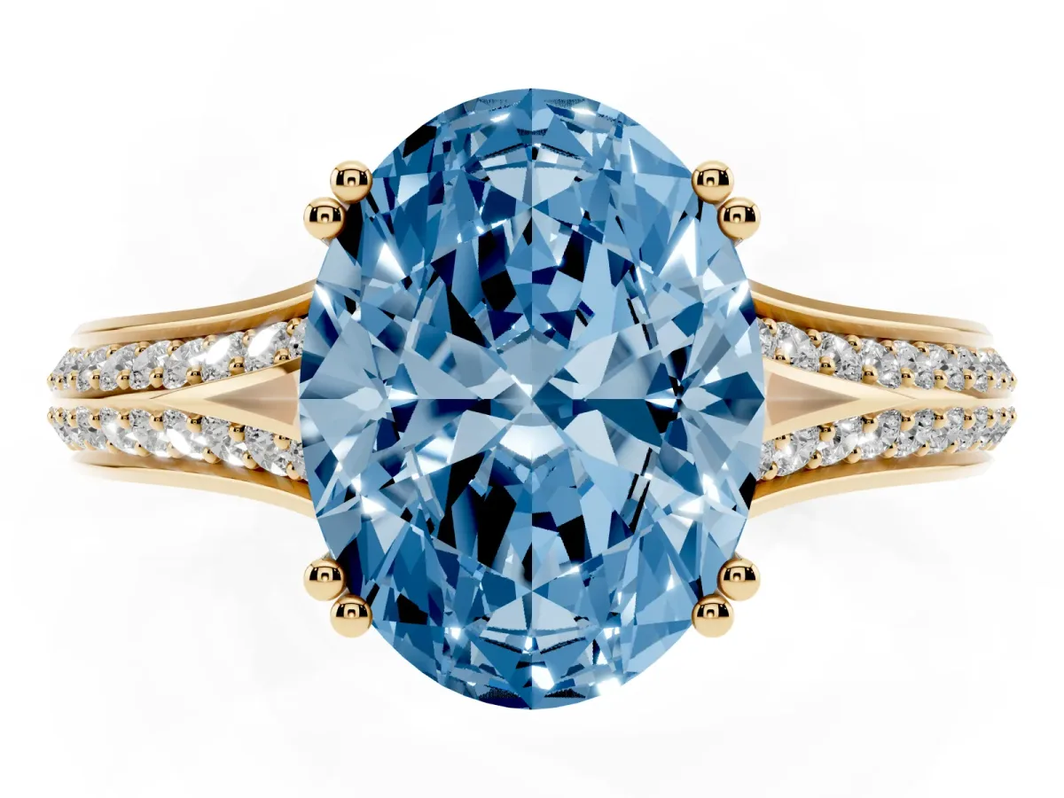 Fancy Blue Oval Cut Diamond Split Shank Engagement Ring with Pavé Band Yellow gold