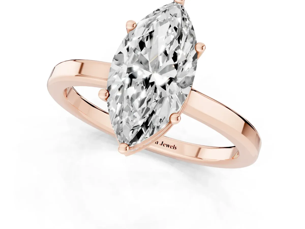 Marquise Cut Cut Solitaire Engagement Ring with Four-Prong Setting on a Classic Band Rose gold