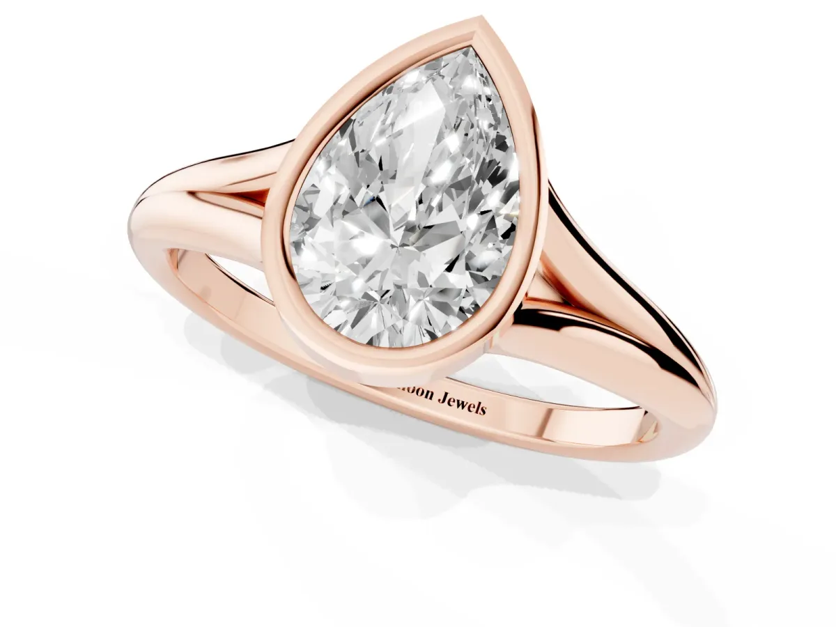 Bezel Set Pear Cut Cut Solitaire Ring with Tapered Band Rose gold