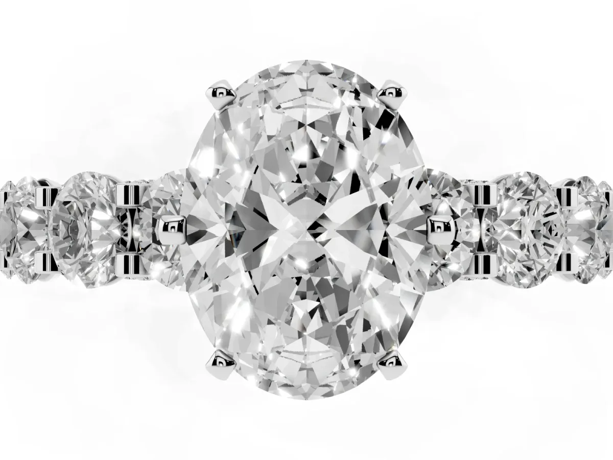 Oval Cut Diamond Side Stone Engagement Ring with Four-Prong Setting Silver