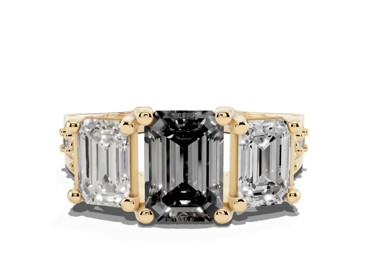 Fancy Black Emerald Cut Diamond Three-Stone Ring with Channel Set Band and Four-Prong Setting Yellow gold