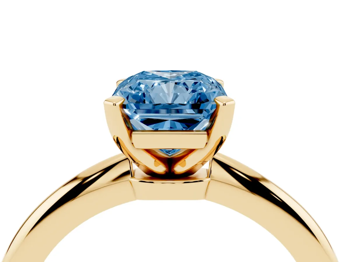 Fancy Blue Radiant Cut Diamond Solitaire Ring with Prong Setting and Classic Band Yellow gold