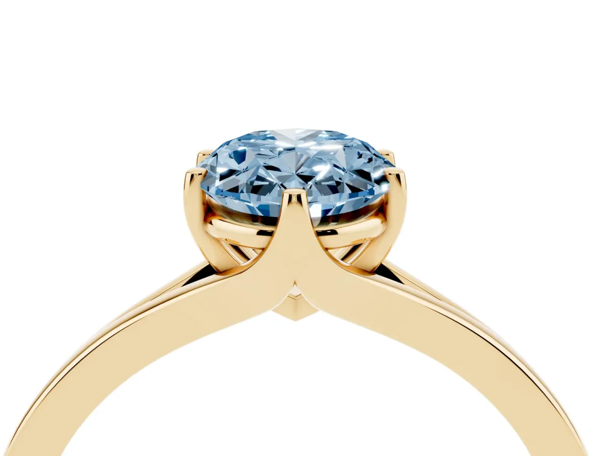 Fancy Blue Oval Cut Solitaire Diamond Ring with Six-Prong Setting and Tapered Band Yellow gold