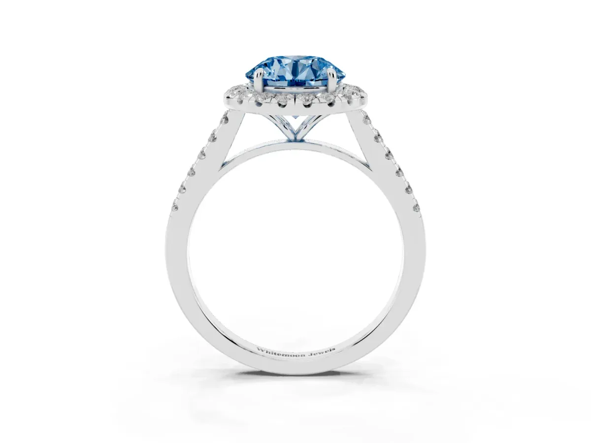 Fancy Blue Round Cut Halo Pave Diamond Engagement Ring with Four-Prong Setting Silver