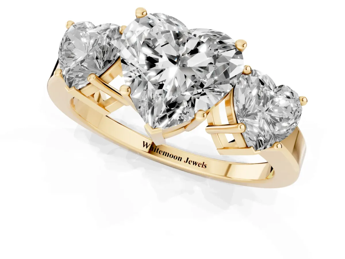 Three-Stone Heart Cut Cut Diamond Engagement Ring with Flat Band and Four-Prong Setting Yellow gold