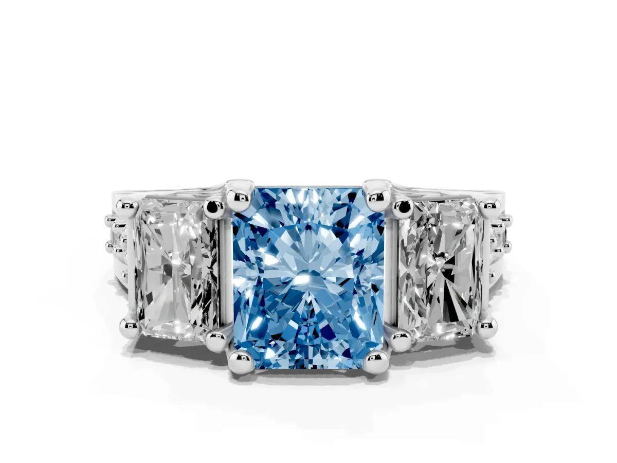 Fancy Blue Radiant Cut Diamond Three-Stone Ring with Channel Set Band and Four-Prong Setting Silver