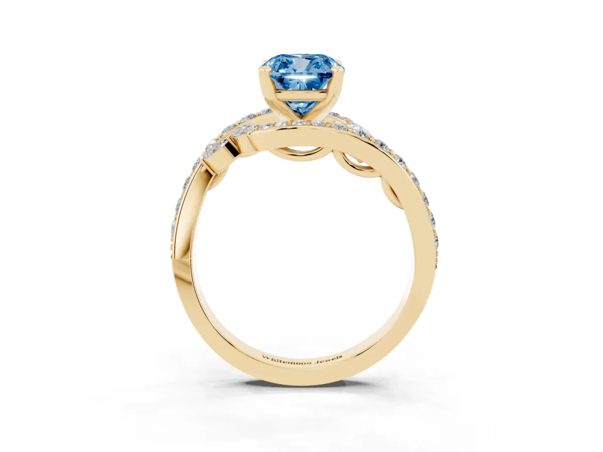Fancy Blue Cushion Cut Solitaire with Pavé Twist Band and Four-Prong Setting Yellow gold