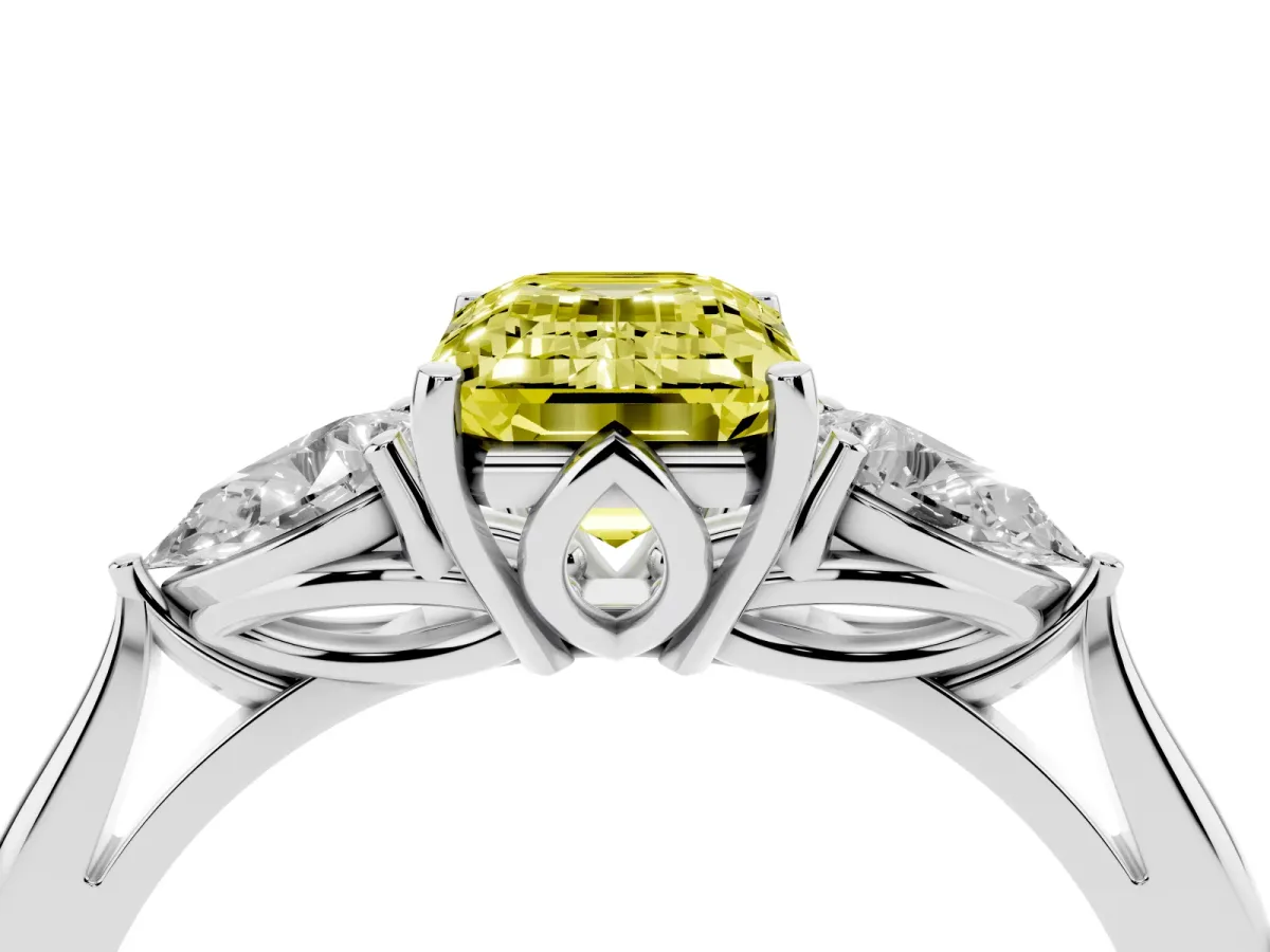 Fancy Yellow Emerald Cut Diamond Three-Stone Ring with Pear Side Stones and Prong Setting Silver