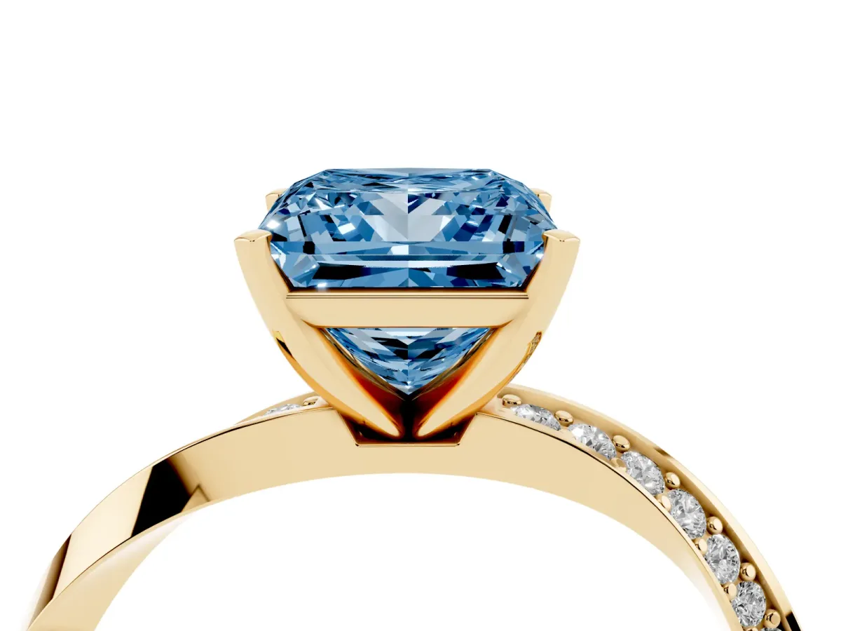 Fancy Blue Princess Cut Diamond Engagement Ring with Side Stone Accents and Four-Prong Setting Yellow gold