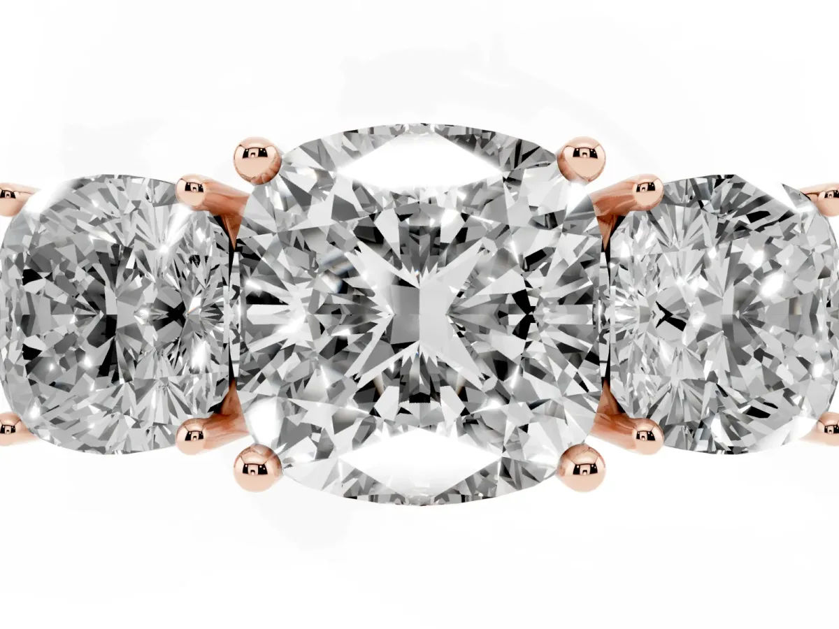 Three-Stone Cushion Cut Cut Diamond Engagement Ring with Prong Setting on a White Gold Band Rose gold