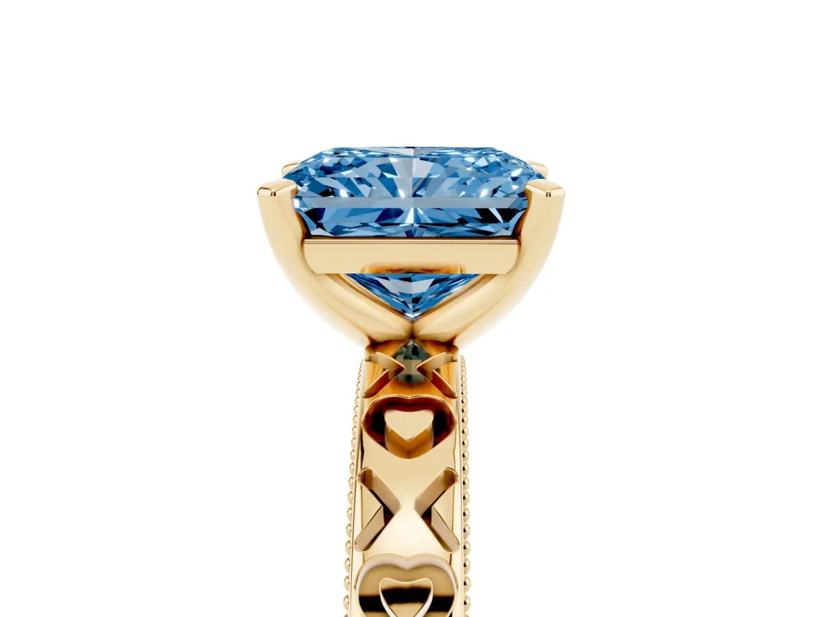 Fancy Blue Radiant Cut Solitaire Diamond Engagement Ring with XO Engraved Band and Four-Prong Setting Yellow gold